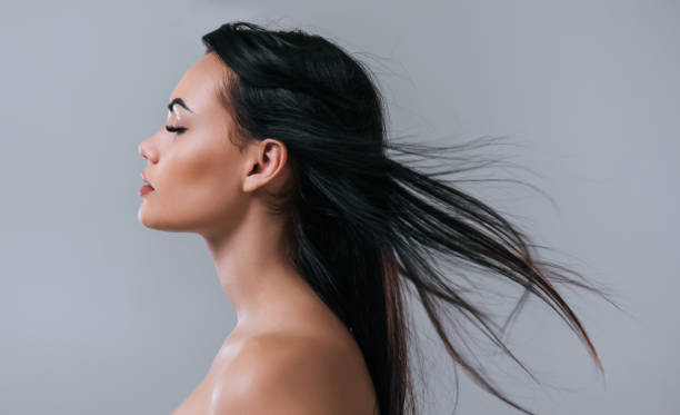 istock Beautiful woman on grey background. 899104606