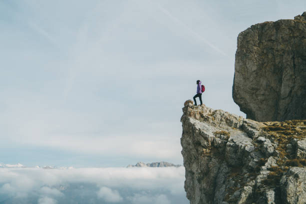 istock Woman  standing on Seceda mountain in Dolomites 899107220