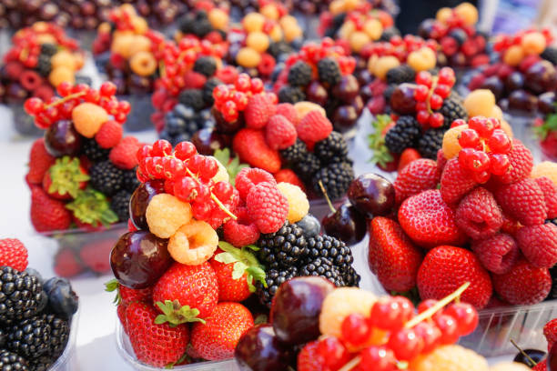 istock fresh fruits sold in market 899111380