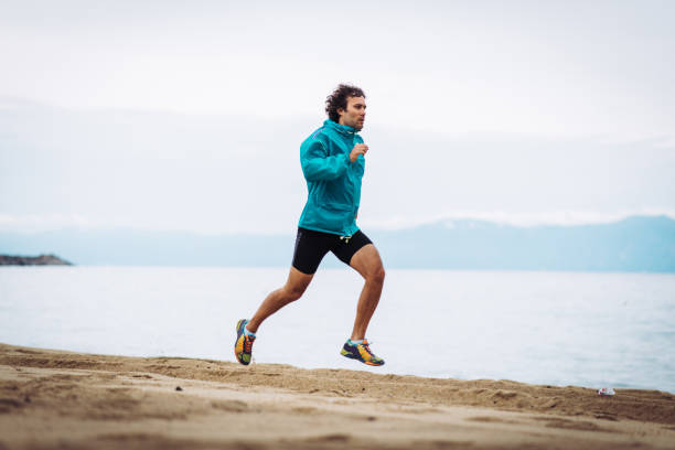 istock Jogging near the sea shore 899112148