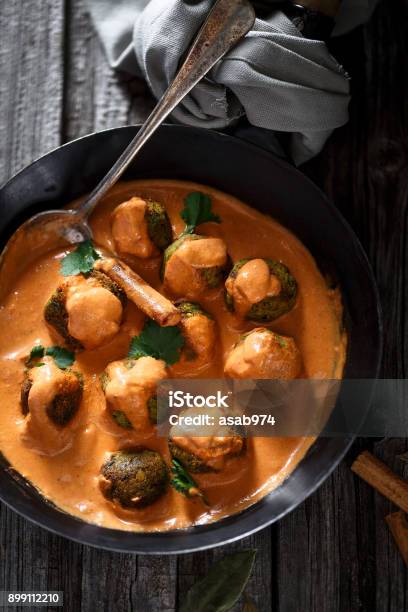 Delicious Vegan Indian Kofta With Tomato And Coconut Sauce Stock Photo - Download Image Now