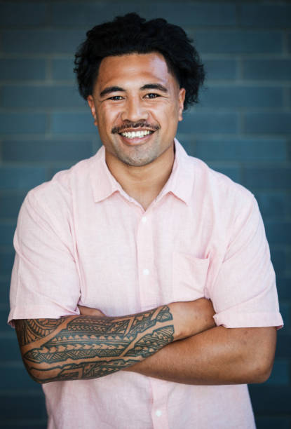 istock Confident young samoan man smiling. 899113930