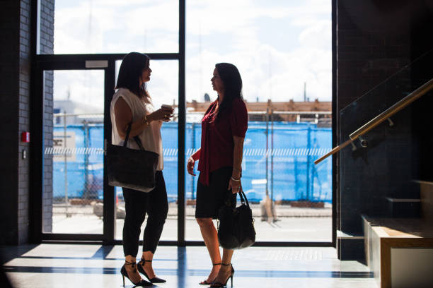 istock Two business woman discussing theri plans. 899113960