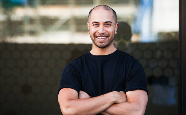 Young Maori man with big smile on his face. stock photo