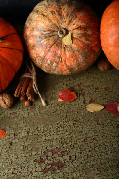 istock pumpkin thanksgiving background, food closeup 899114156