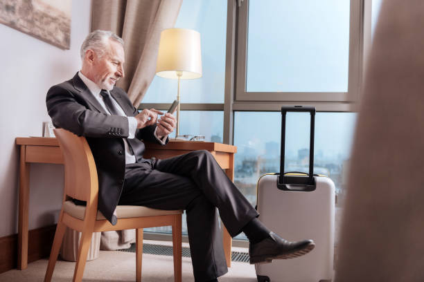 istock Senior glad businessman  ready to leave 899121524