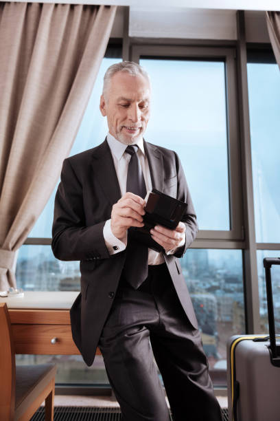 istock Happy senior man found his credit card 899121738