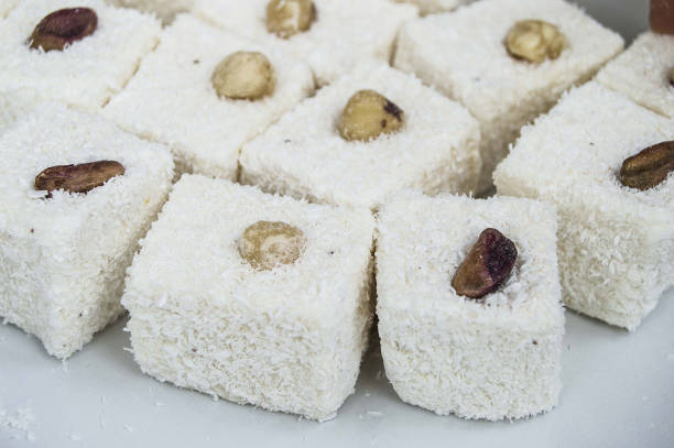istock Turkish delight with hazelnut, enter the new year by eating delight, Turkish delight with hazelnut on famous coconut turkish lokum pictures 899126202