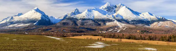 Panoramic view of High Tatras mountains covered with snow in winter season, Slovakia.