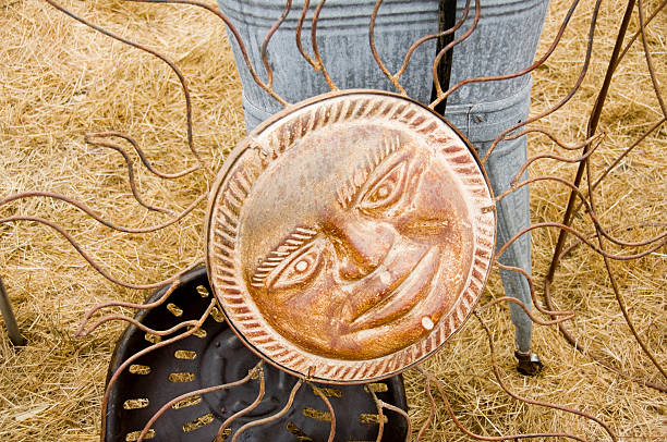 Decorative art still life of sun shaped metalwork