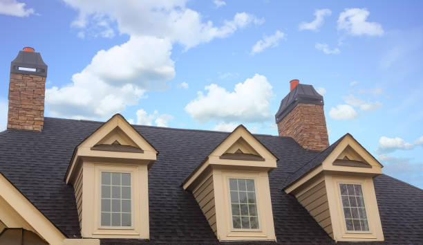 Three Dormers and Two Chimneys Three Dormers and Two Chimneys on Residential Roof dormer stock pictures, royalty-free photos & images