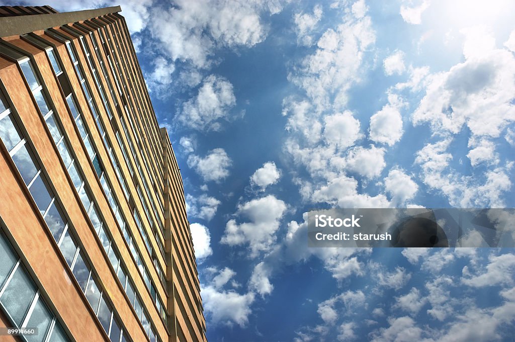 apartments building and cloudy sky  Apartment Stock Photo