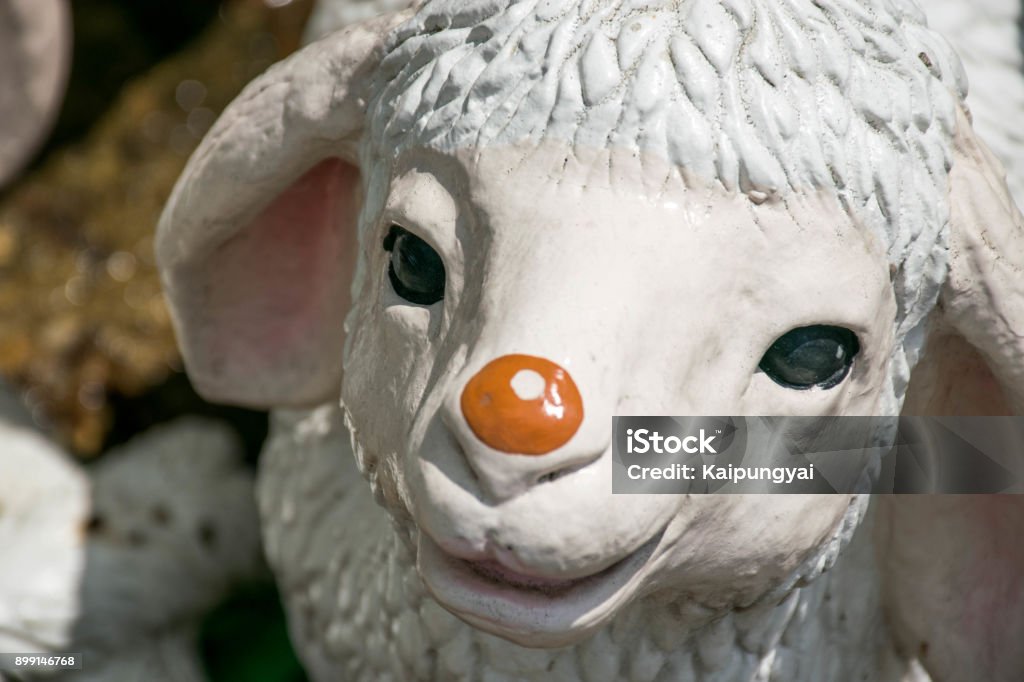 Lamb sculpture is smiling. Dolly the Sheep Stock Photo