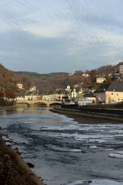 istock Hiking along river Semois passing through Bouillon - Winter Series 899149340