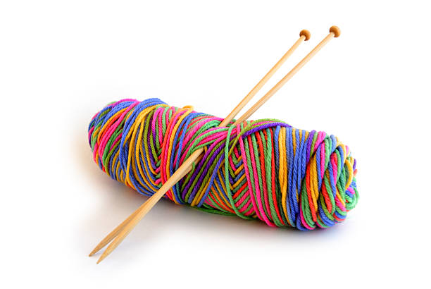 Yarn with knitting needles  skein stock pictures, royalty-free photos & images