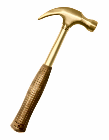 Golden hammer. Isolated on white.