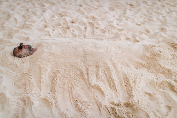 istock Buried in the sand 899168838