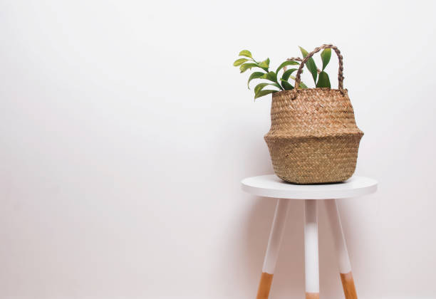 istock Minimalistic interior decor with plant in straw basket 899169740