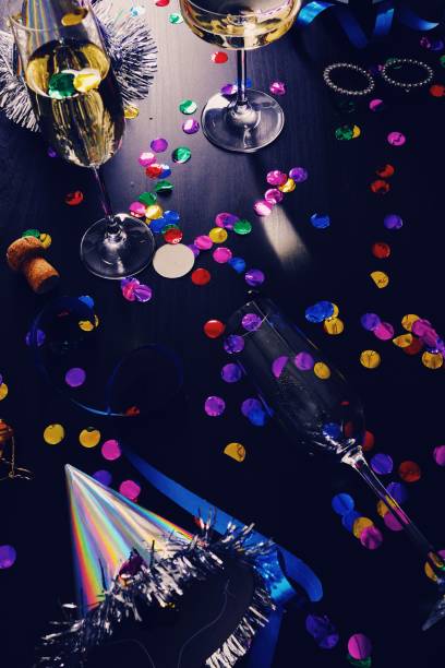 istock Messy New years still life background party place setting 899180152