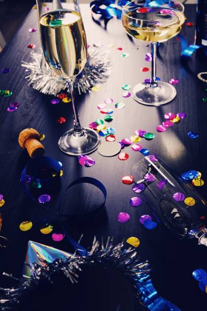 istock Messy New years still life background party place setting 899180214