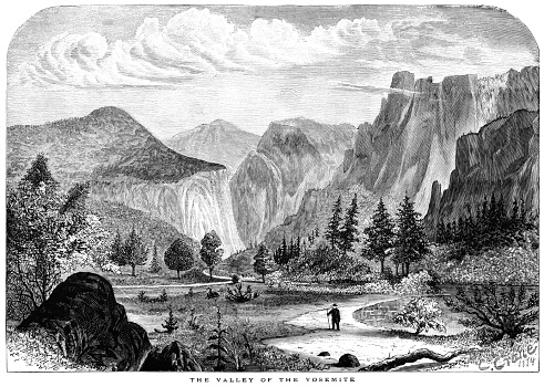 A solitary man walking in the Valley of the Yosemite, California.