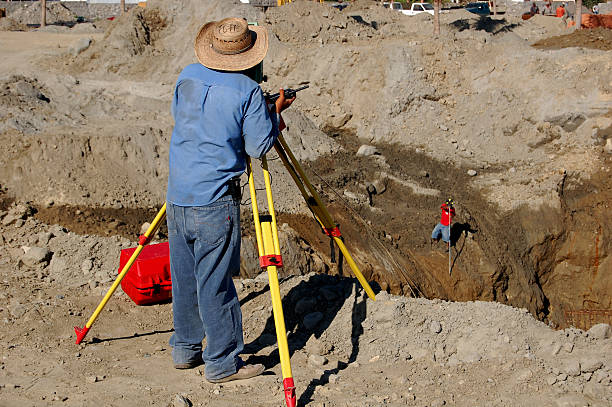 istock Land Surveyor Surveying Construction Site 89918410