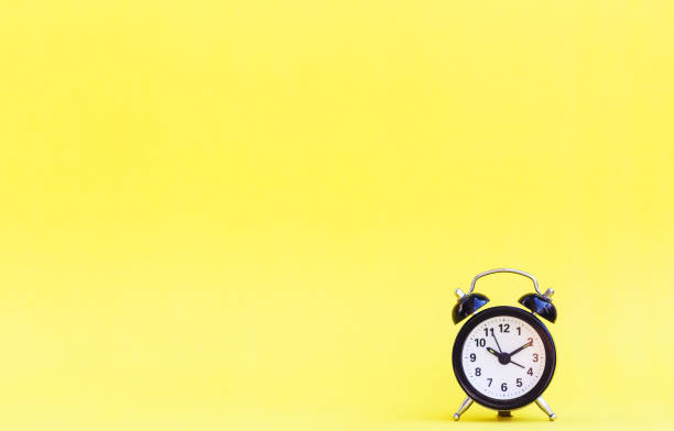 istock Minimalism of alarm clock 899184208