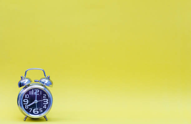 istock Minimalism of alarm clock 899184240