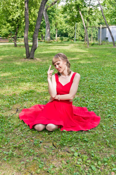 istock Lady in red dress 899185024