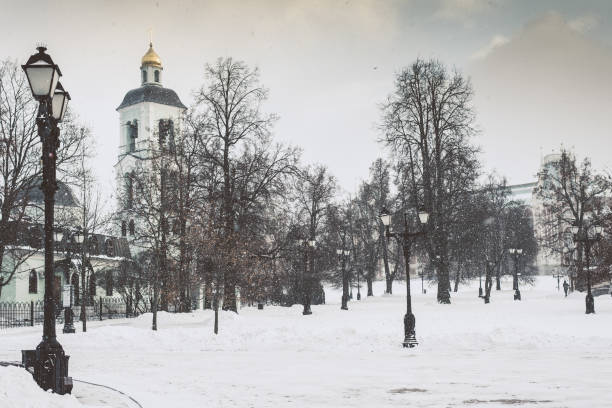 istock Russian winter landscape - Ancient Russian church during a snowfall 899185178
