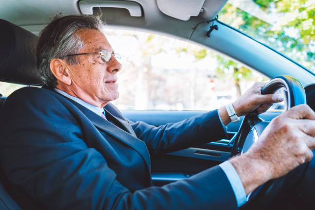 istock Confident businessman driving to work 899185368