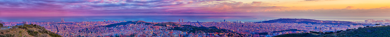 Huge panorama of Barcelona skyline at dusk. More than 2 meters long.