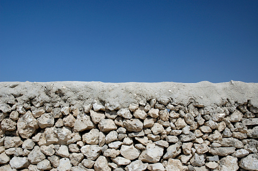 Large blocks of marble partly cut out of the Apuan Alps in one the quarries near Carrara, Italy