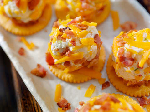 Bacon and Cheddar Cheese Ball on a White Platter