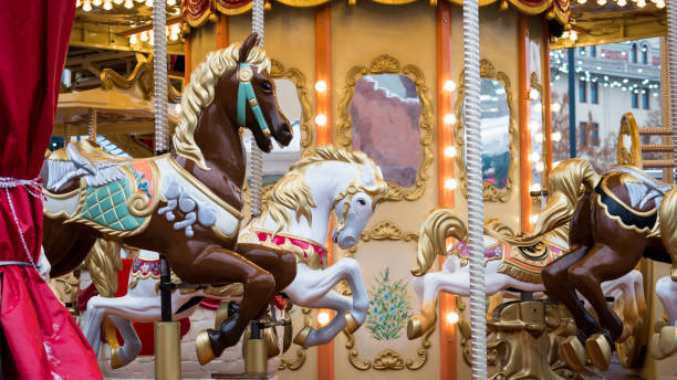 istock Carousel. Horses on a carnival Merry Go Round. 899191820