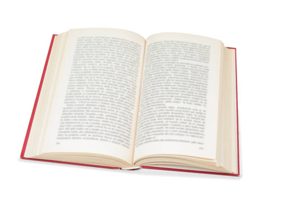 istock Opened old book on the white background 899199494