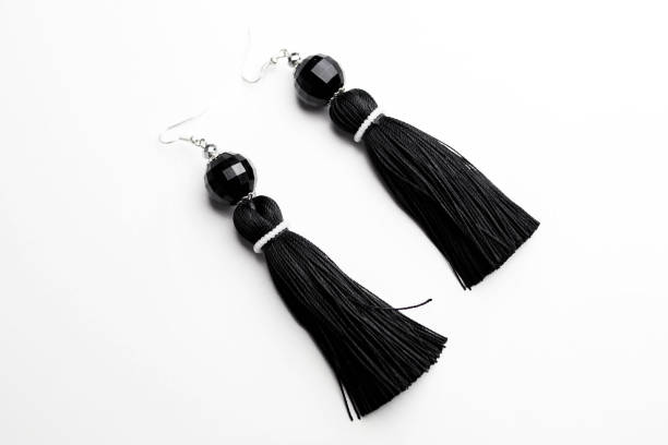 istock Luxury earrings in black on white 899199714