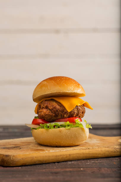 istock Homemade Hamburger on Wooden Background 899203222
