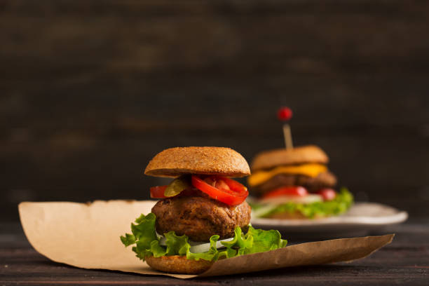 istock Homemade Hamburger on Wooden Background 899203234