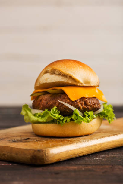 istock Homemade Hamburger on Wooden Background 899203236