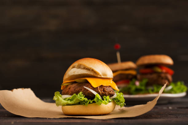 istock Homemade Hamburger on Wooden Background 899203240