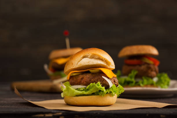 istock Homemade Hamburger on Wooden Background 899203246