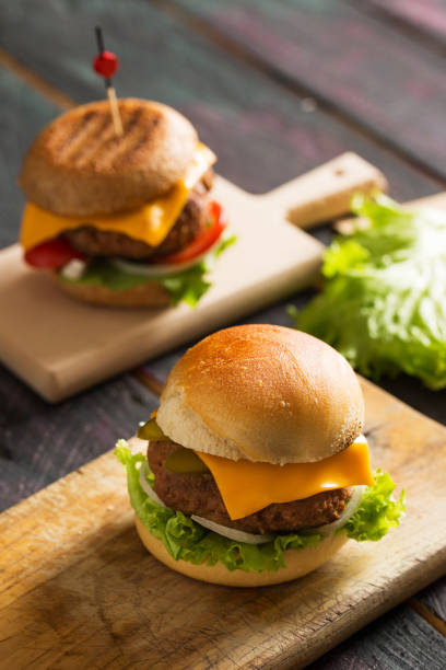 istock Homemade Hamburger on Wooden Background 899203266