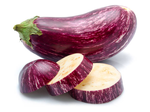 istock Purple sliced eggplant vegetables isolated 899206986