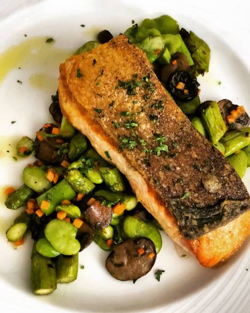 istock Grilled salmon with vegetables on a plate 899210626