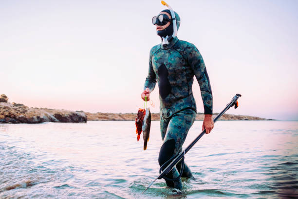 istock back from spear fishing 899214132
