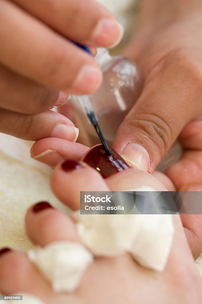 Nail polish in pedicure  Beautician Stock Photo