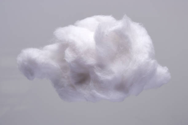 Clouds Made of Real Cotton Cotton Wool Cloud isolated on Grey Background with Text Space. Top View of Clouds Made of Cotton cotton cloud stock pictures, royalty-free photos & images