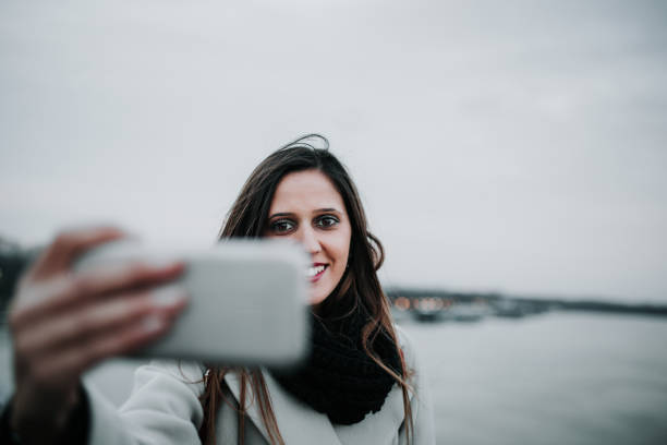 istock Cute girl taking a selfie 899222272