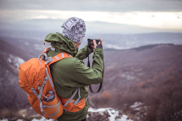 istock Photographer hiker in nature 899225394